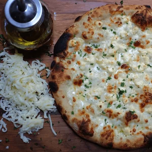 pizza cuatro quesos receta